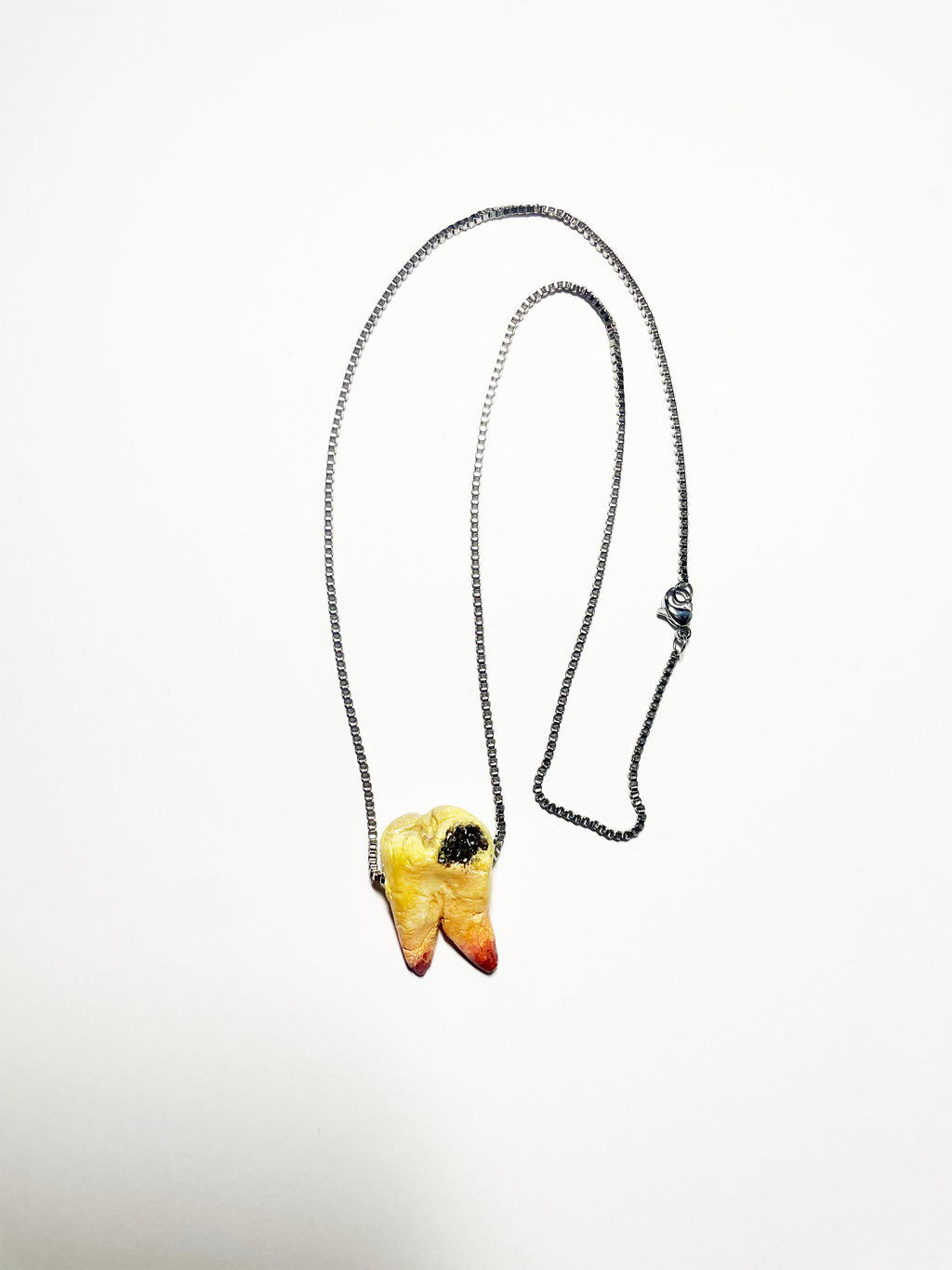 "cavities" necklace